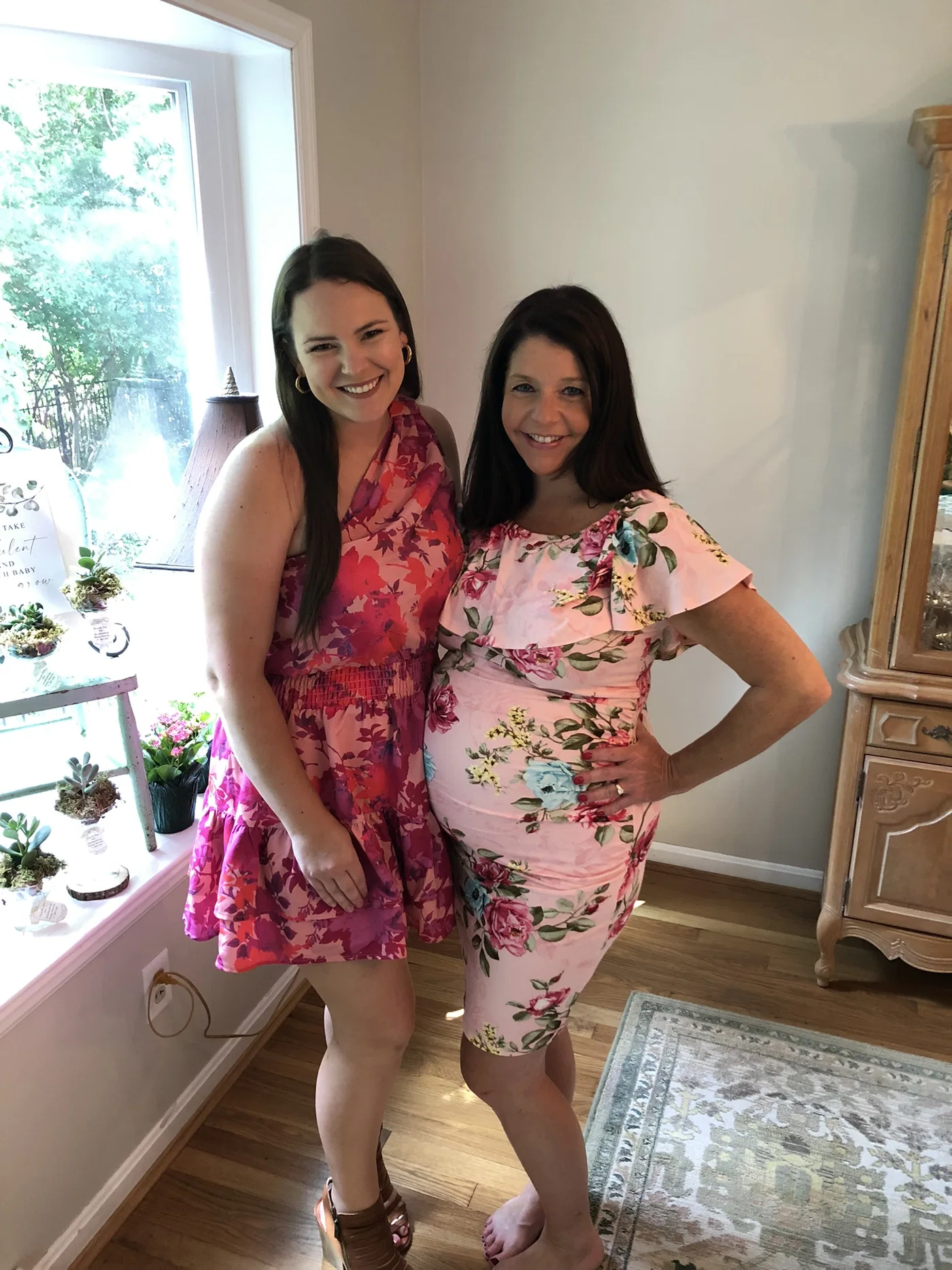 Julia Meyer standing beside a pregnant client after an unhurried visit
